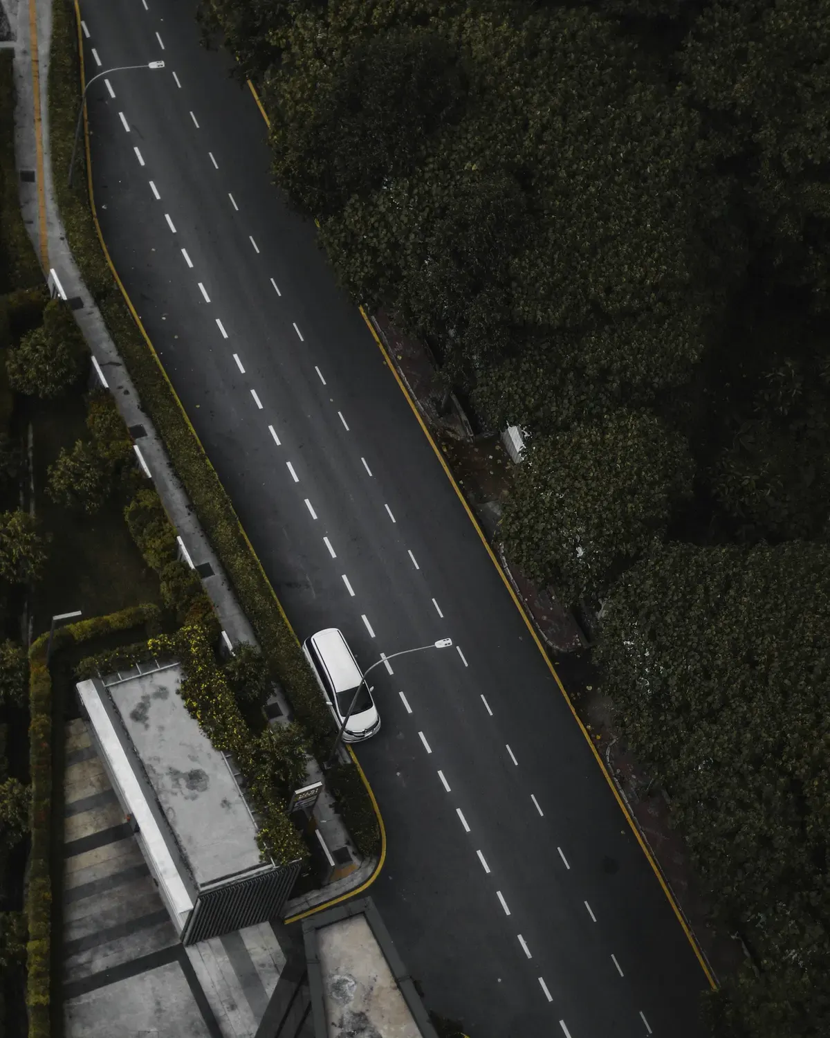 Aerial view of a tree-lined road in Bangsar
