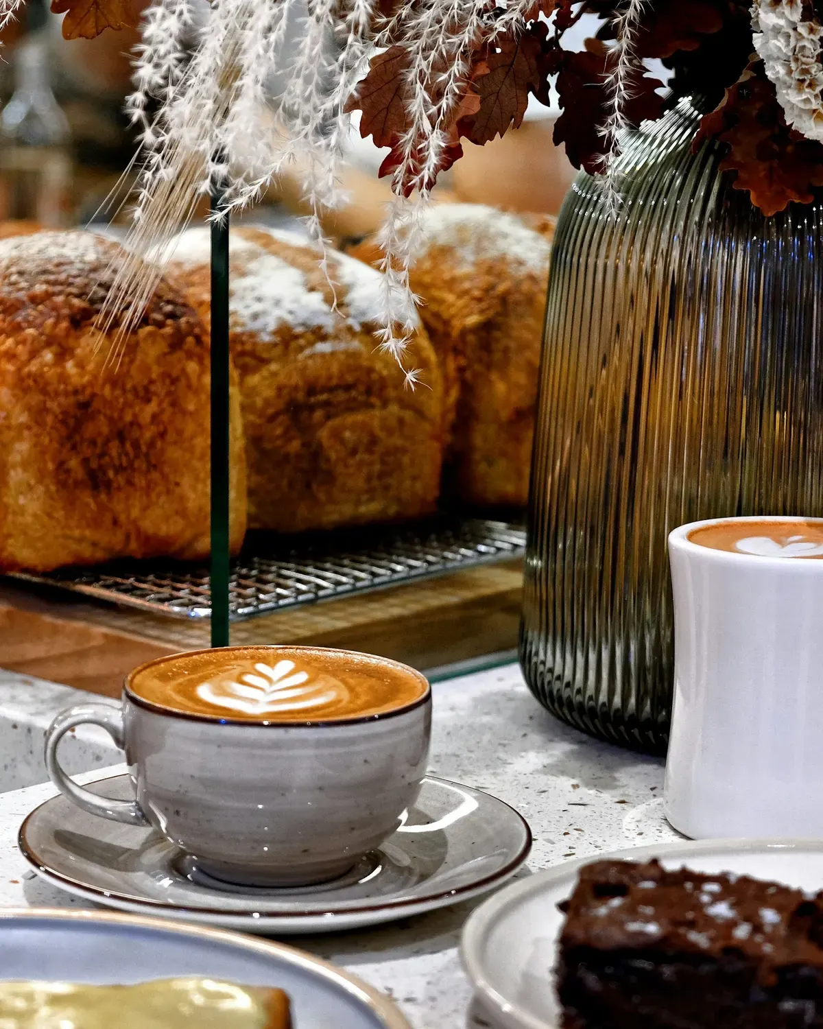 Coffee and pastries on a café table