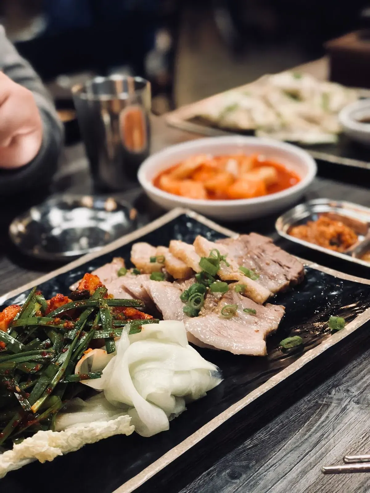 Korean barbecue dishes laid out on a table
